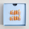 Orange Chrome Moderne Nails in packaging