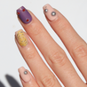 Angled photo of light skinned hand with Freestyle 3D Chrome Nails