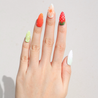 Light skinned hand with Fruit Chunk 3D Nails