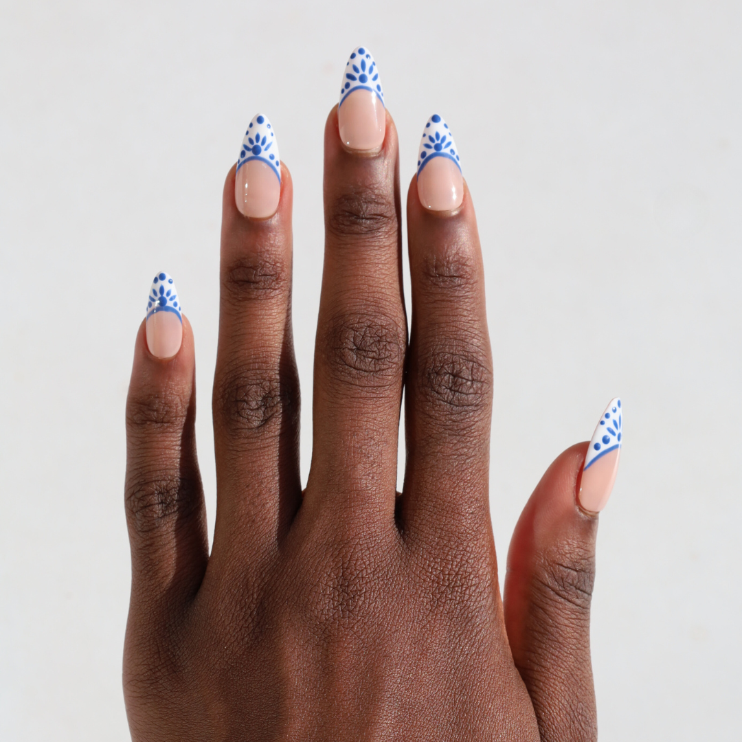 Dark skinned hand with Mediterranean Porcelain Nails