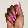 Dark skinned hand with Chrome Pink Coffin Nails
