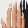 Light skinned hand with Pastel Glazed 3D Bow Nails