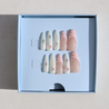 Pastel Glazed 3D Bow Nails in packaging