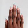 Dark skinned hand with Mermaid 3D French Tip Nails
