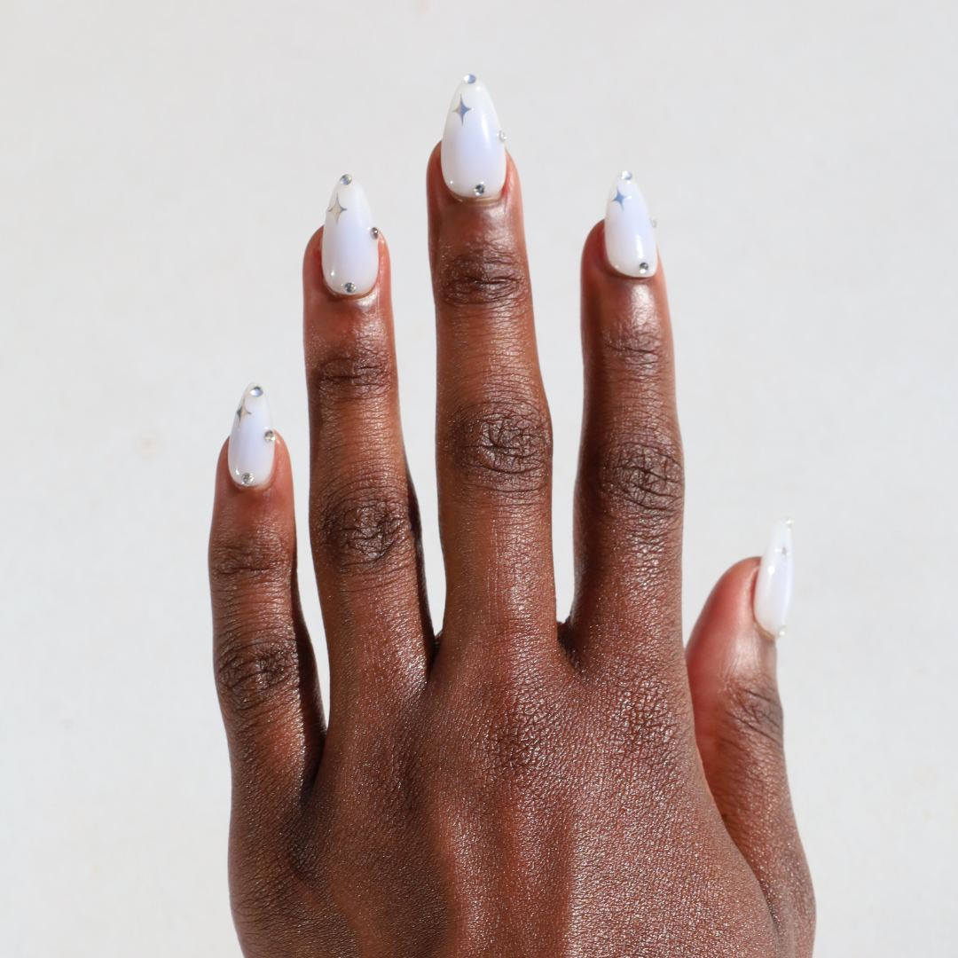 Dark skinned hand with Celestial Blue Aura Nails