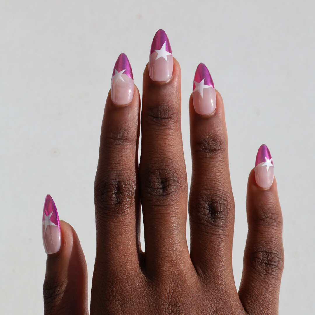 Dark skinned hand with Pink Star Chrome French Tips