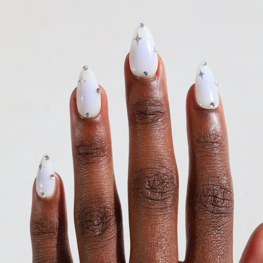 Dark skinned hand with Celestial Blue Aura Nails