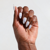 Dark skinned hand with Celestial Blue Aura Nails