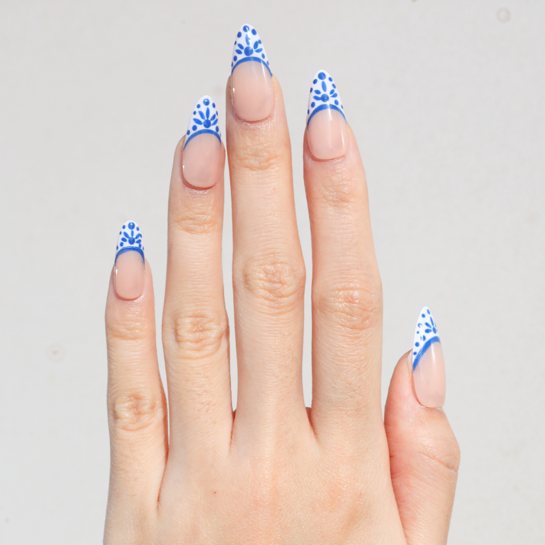 Light skinned hand with Mediterranean Porcelain Nails