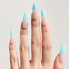 Light skinned hand with Mermaid Coffin Nails