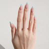 Light skinned hand with Mermaid 3D French Tip Nails