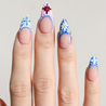 Light skinned hand with Colorful Mediterranean Porcelain Nails