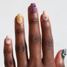Dark skinned hand with Freestyle 3D Chrome Nails