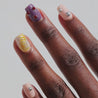Video of dark skinned hand with Freestyle 3D Chrome Nails