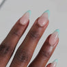 Dark skinned hand with Mermaid 3D French Tip Nails