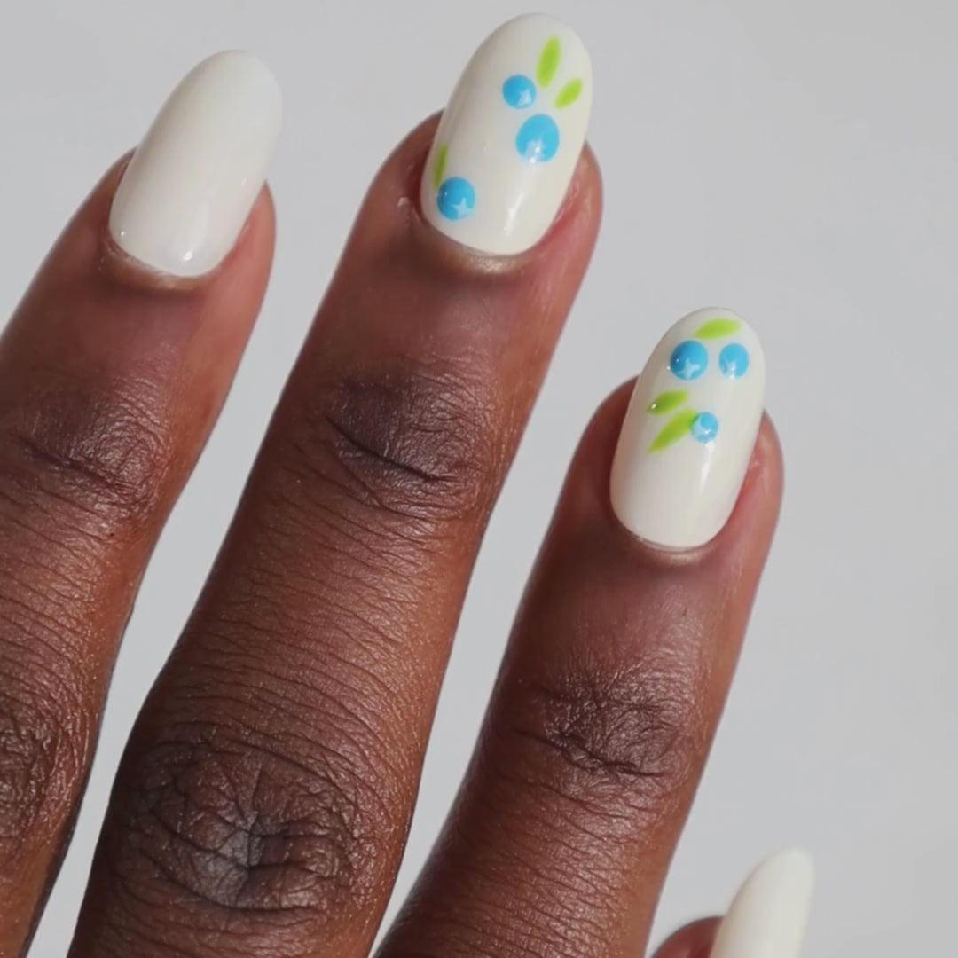 Video of dark skinned hand with Blueberry Nails