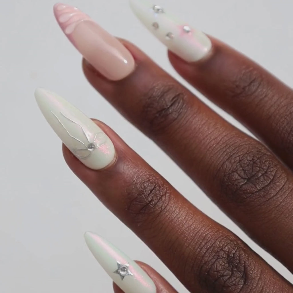 Video of dark skinned hand with Pastel Glazed 3D Bow Nails