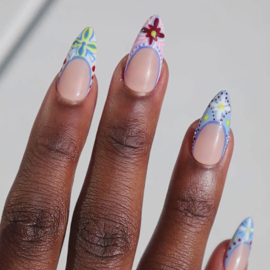 Video of dark skinned hand with Colorful Mediterranean Porcelain Nails