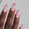 Video of dark skinned hand with Pink Gem Floral French Tips