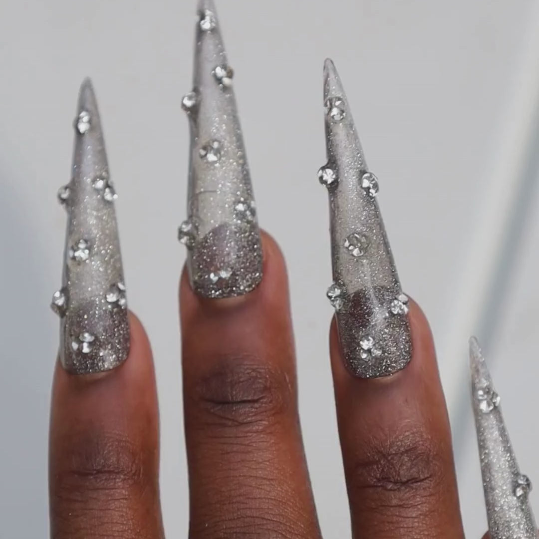 Video of dark skinned hand with Diva Gems Nails